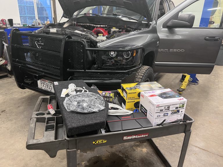 Gray Ram diesel on the lift for engine work