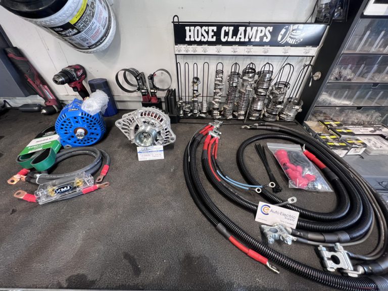 Diesel Losing Power Under Load? 6 Common Causes and How a Shop Finds Them 3 Diesel fuel and air system parts and hoses laid out during a power loss repair at Midwest Diesel & Automotive